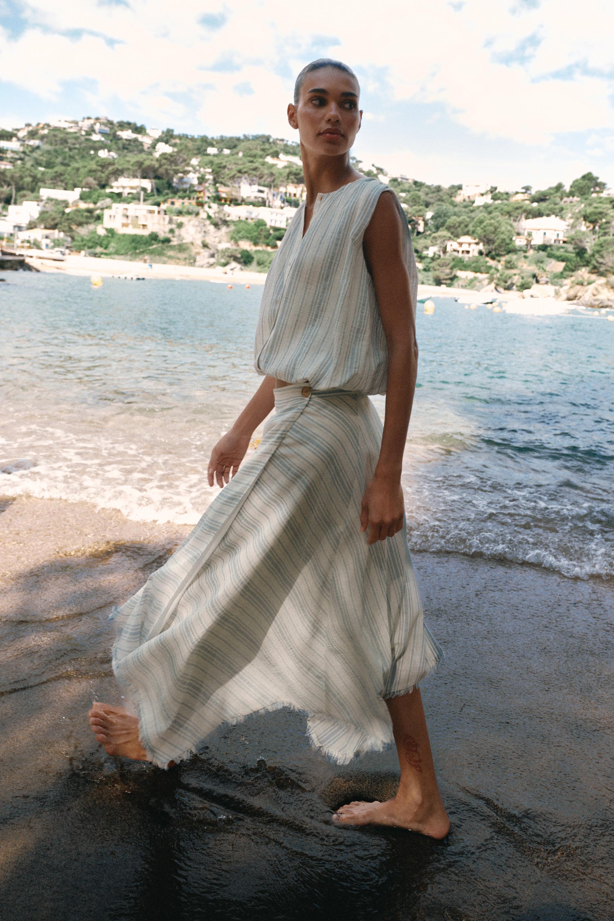 ASYMMETRIC MIDI SKIRT